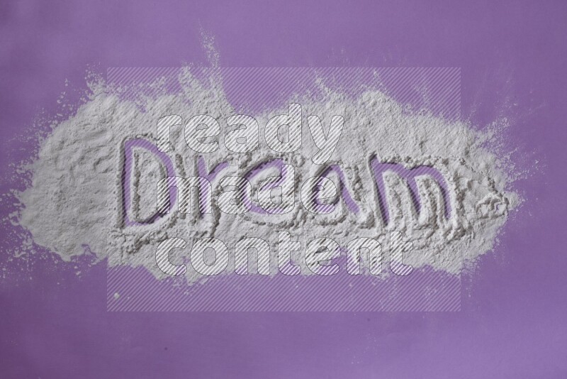 A word written with white powder on purple background