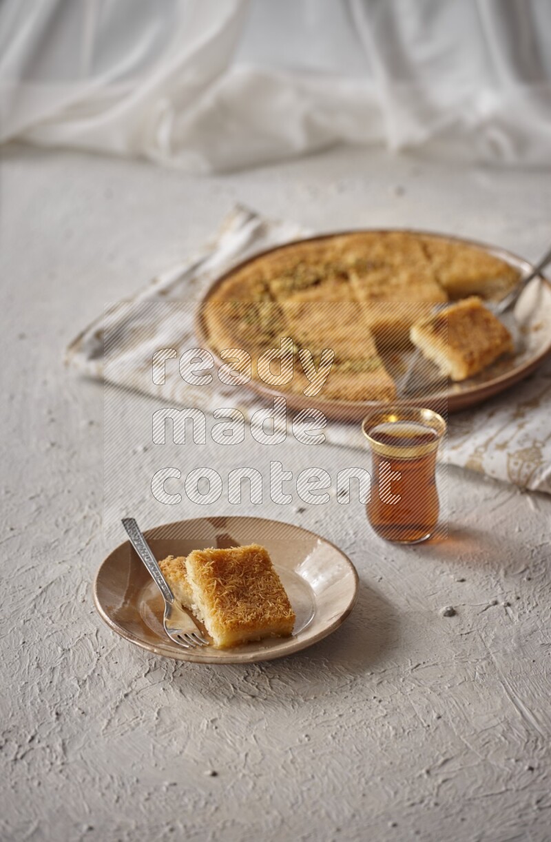 Konafa with tea in a light setup