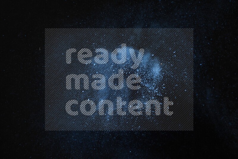 Blue powder explosion on black background