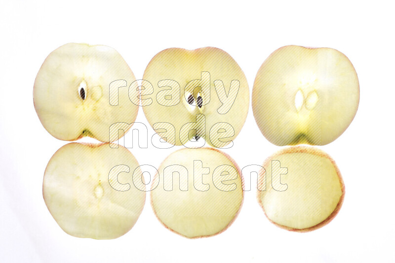 Apple slices on illuminated white background