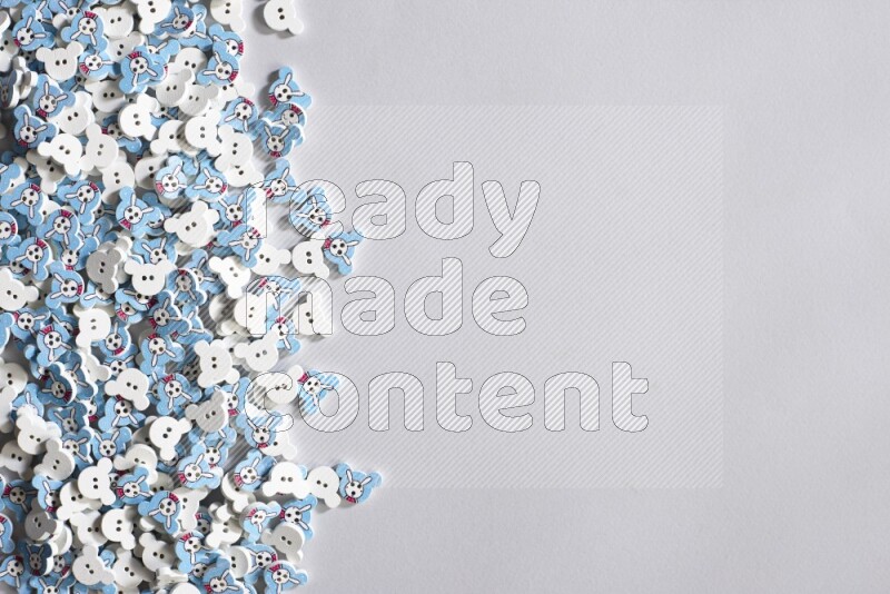 Multicolored buttons placed on grey background