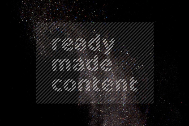 Multicolored glitter powder isolated on black background
