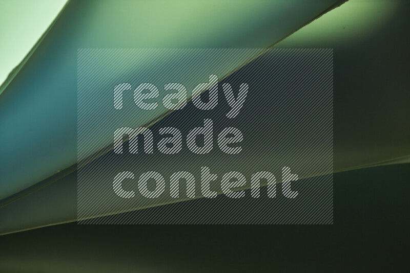 An abstract art piece displaying smooth curves in cold gradients created by colored light