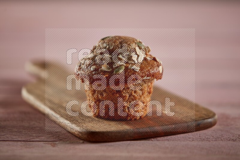 Multigrain cupcake on a wooden board