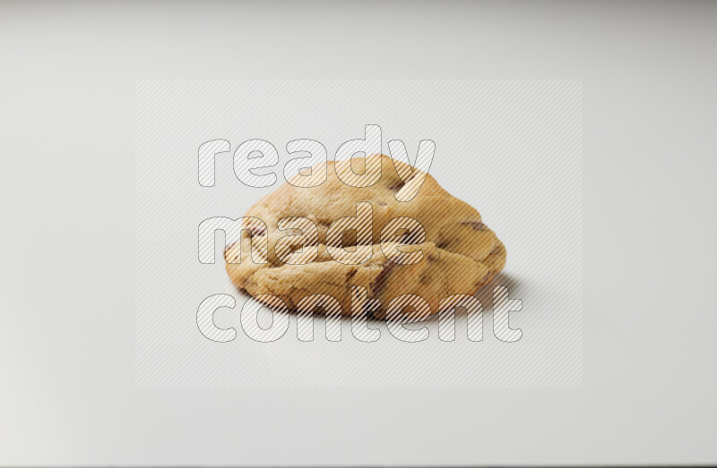 a chocolate chip cookie on a white background