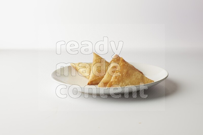 sambosas on a white background