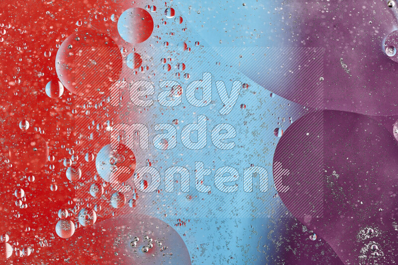 Close-ups of abstract oil bubbles on water surface in shades of blue, red and purple