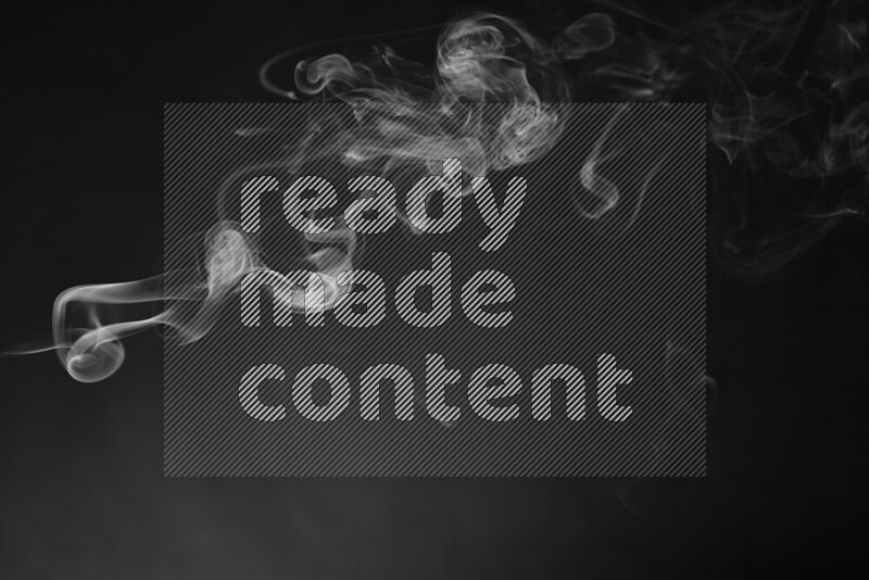 Motion of wavy smoke isolated on dark background