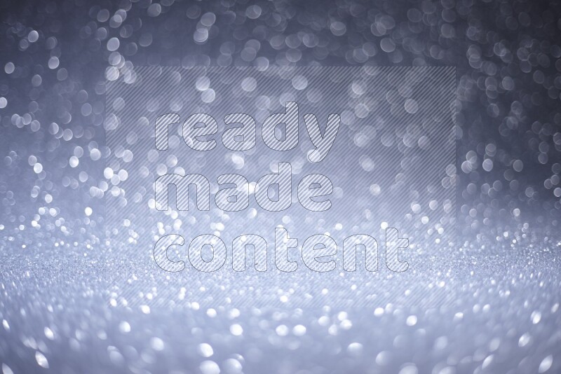 Silver glittery bokeh background