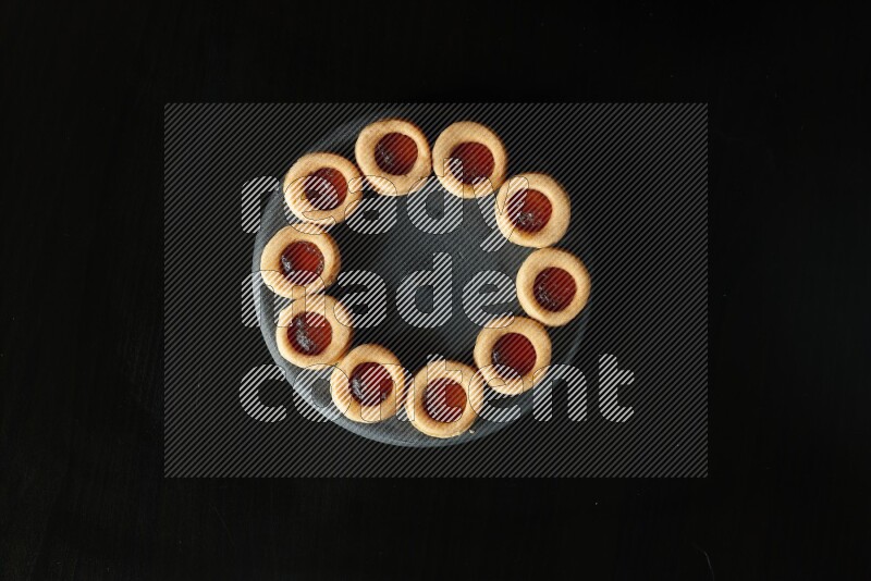 Jam cookies on a black background