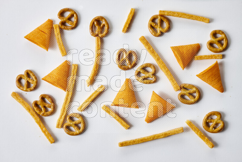 Assorted snacks on white background