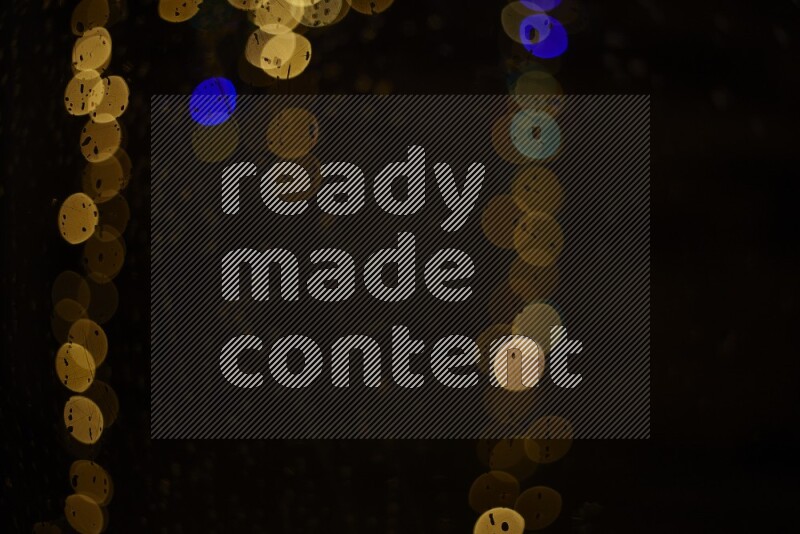 Bokeh light in multicolor with water drops