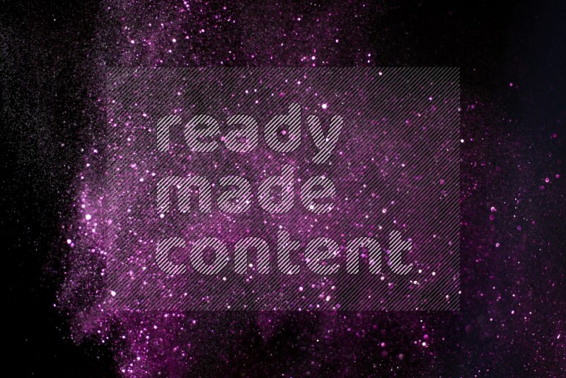 Pink glitter powder isolated on black background
