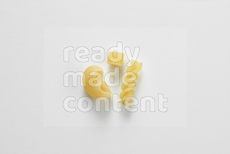 Different pasta types on white background