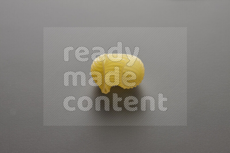 Pipe pasta on grey background