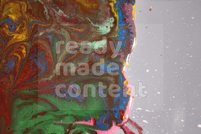 Close-ups of assorted colors blending on a grey background