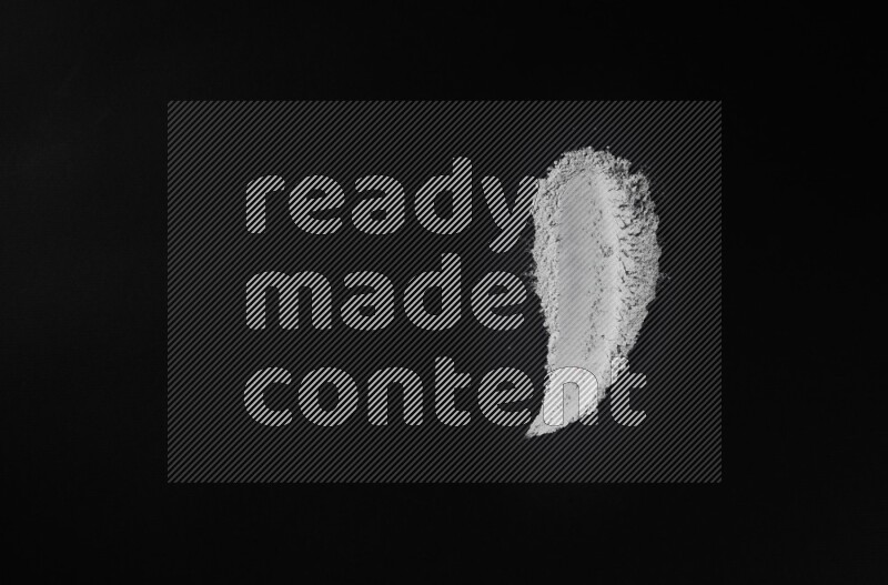 Blue powder smears on black background