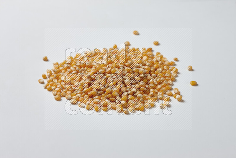 Dry Corn Kernels on white background