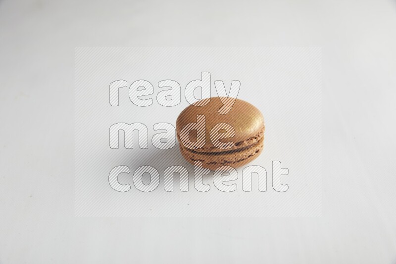 45º Shot of Brown Coffee macaron on white background