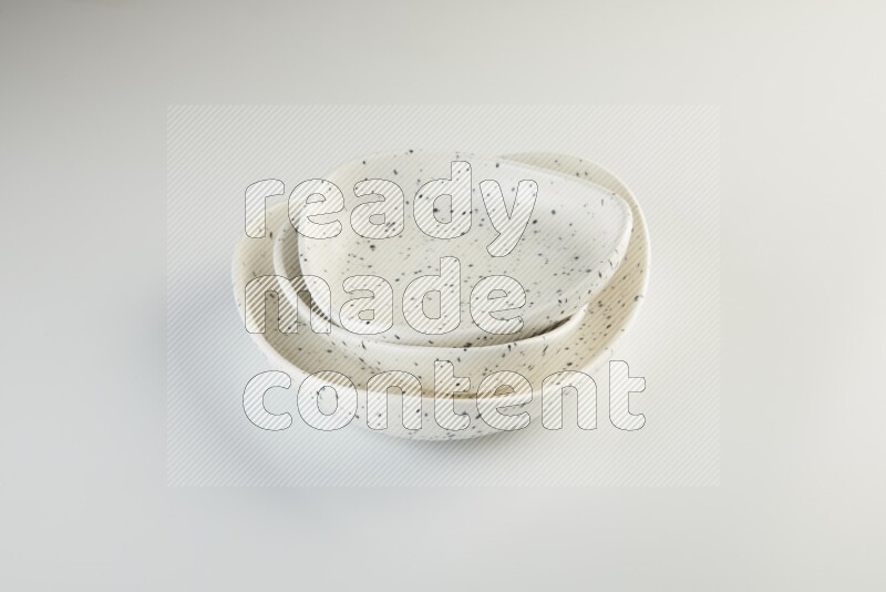 white plate with black dots on white background