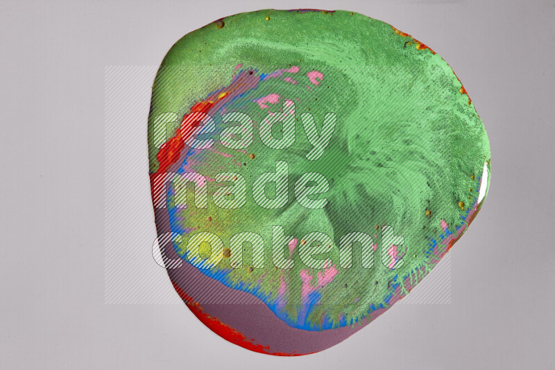 Close-ups of assorted colors blending on a grey background