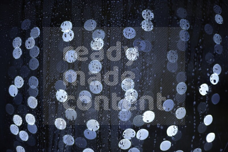 Bokeh light in white with water drops