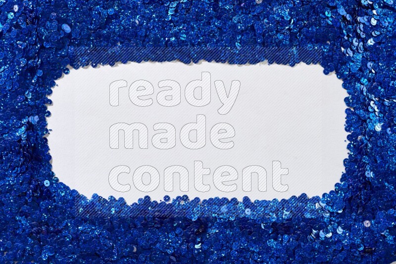 Multicolored flat sequins on grey background