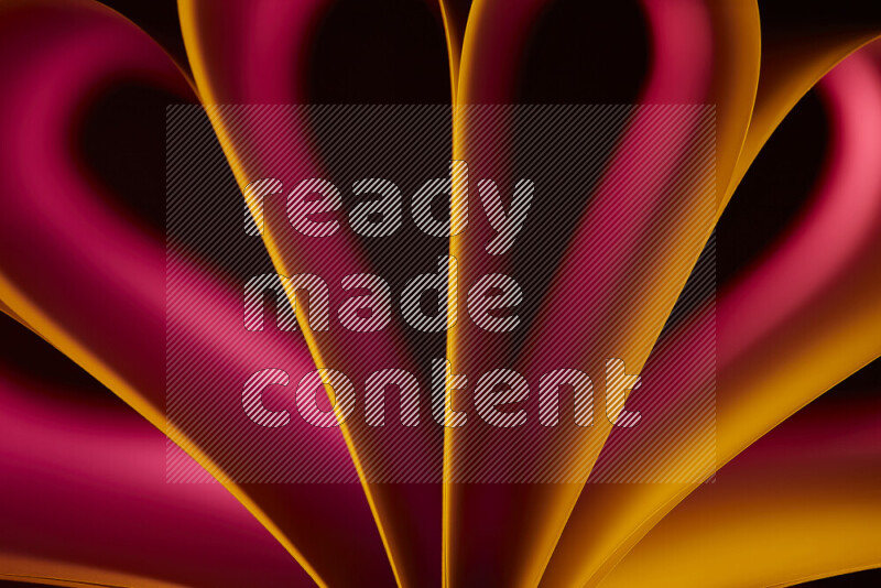 فن تجريدي يعرض منحنيات وتدرجات اللون الأصفر والأحمر مكونه بضوء ملون