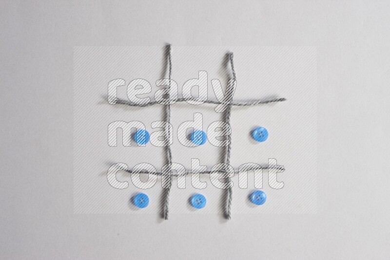 Blue buttons placed on grey background