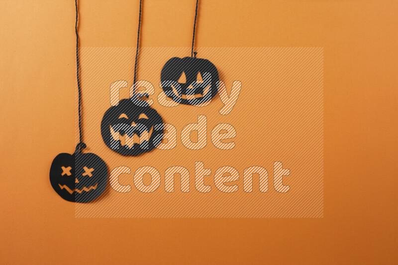 Halloween hand crafts on orange background
