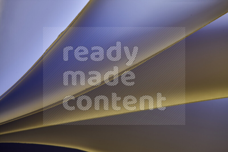 An abstract art piece displaying smooth curves in warm and cold gradients created by colored light