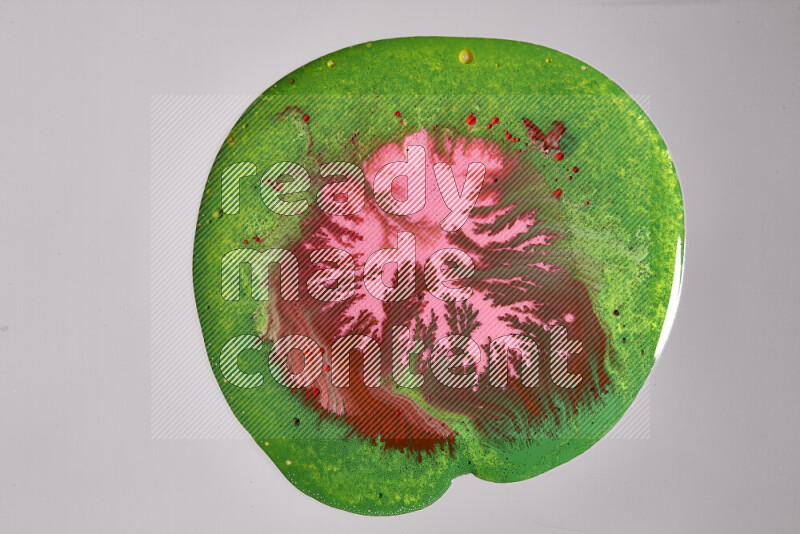 Close-ups of assorted colors blending on a grey background