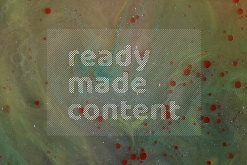 The image captures a dramatic splatter of red paint over a green backdrop