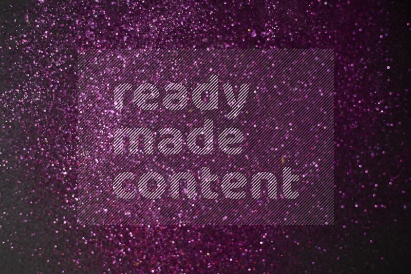 Pink glitter powder isolated on black background