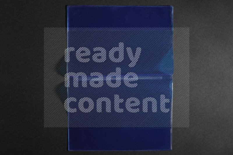 Colored plastic textures on black background