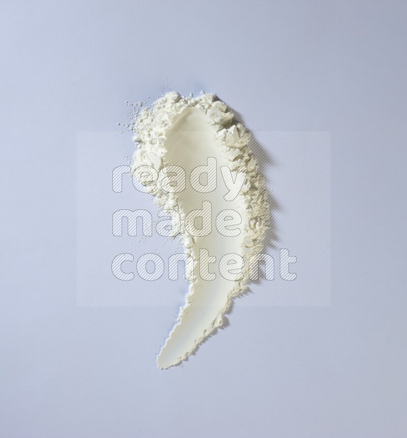 White powder smears on white background