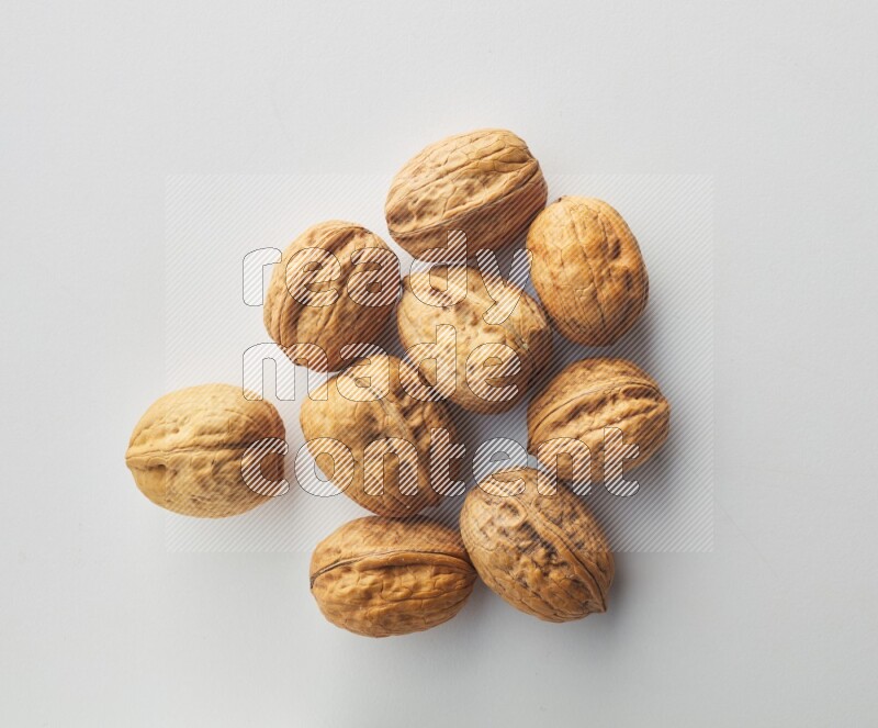 Top-view shot of walnut on white background