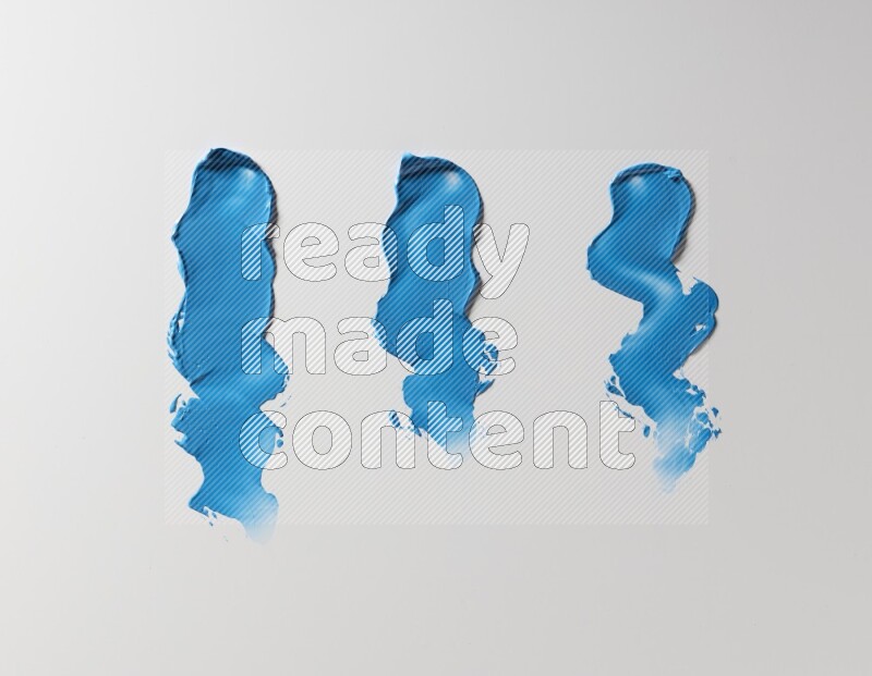 Blue zigzag painting knife strokes on white background