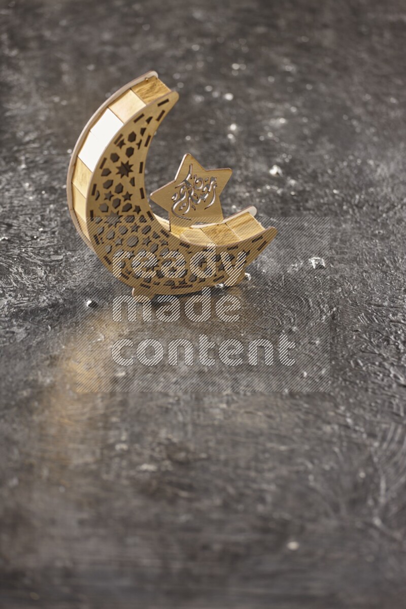 A lantern placed on a textured black background