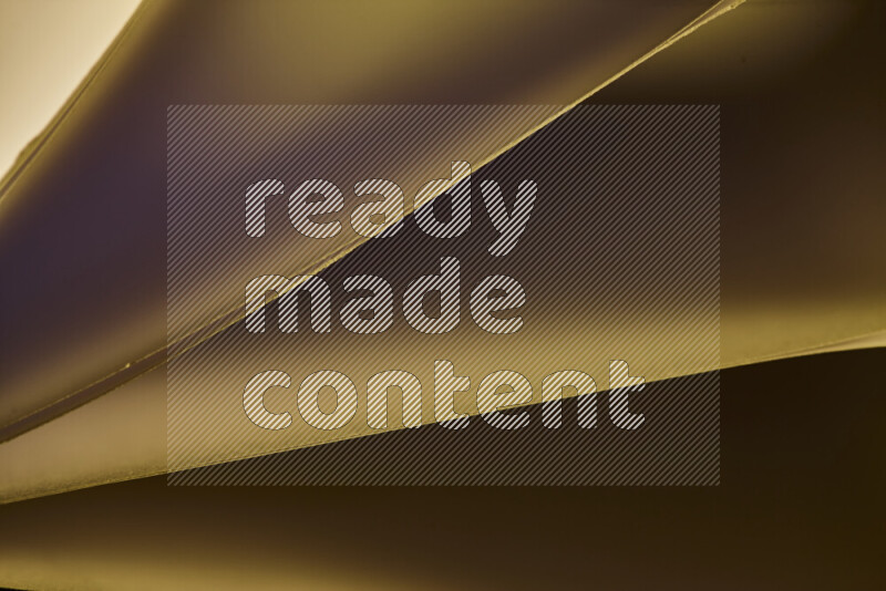 An abstract art piece displaying smooth curves in warm and cold gradients created by colored light