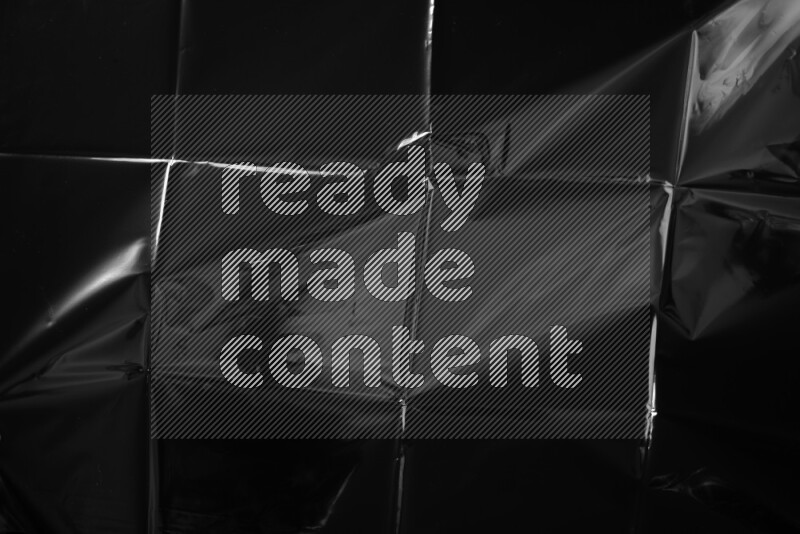 Plastic wrap texture on black background