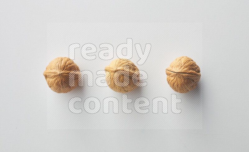 Top-view shot of walnut on white background