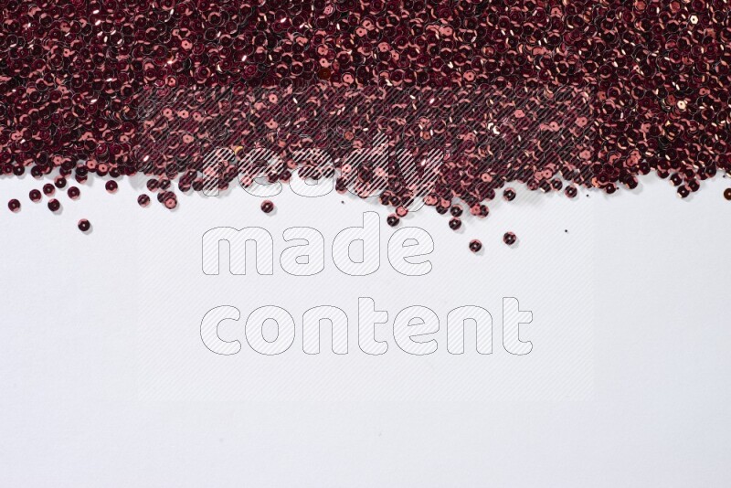 Multicolored flat sequins on grey background