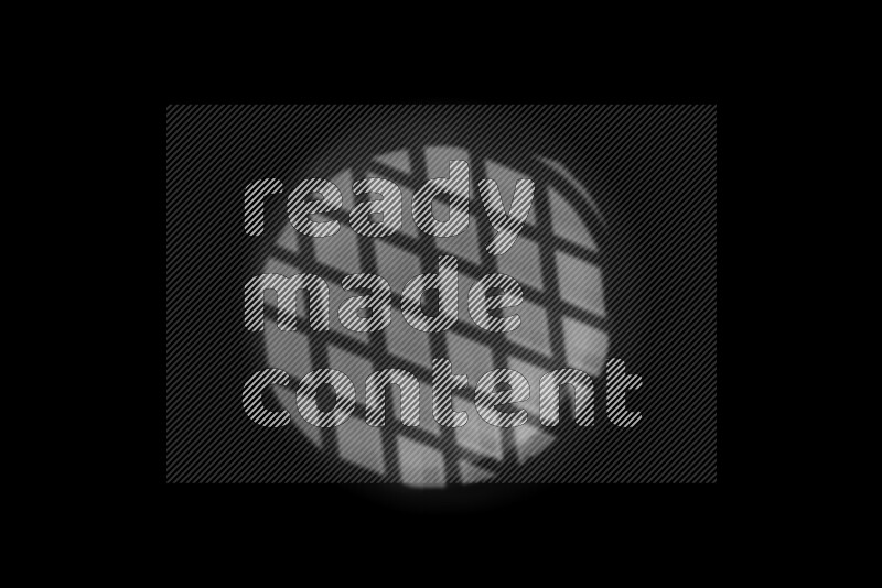 مجموعة من ضوء الغوبو الخافت تظهر أنماط هندسية علي سطح ناعم