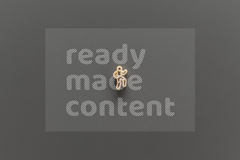 Shaped children pasta on grey background