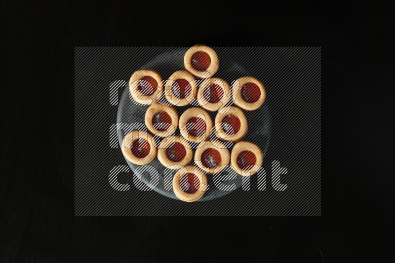 Jam cookies on a black background