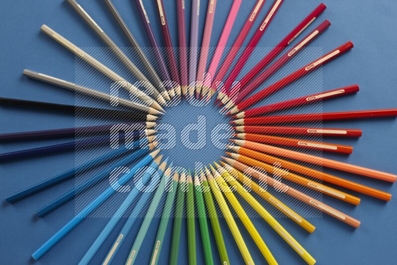 Different school supplies on blue background