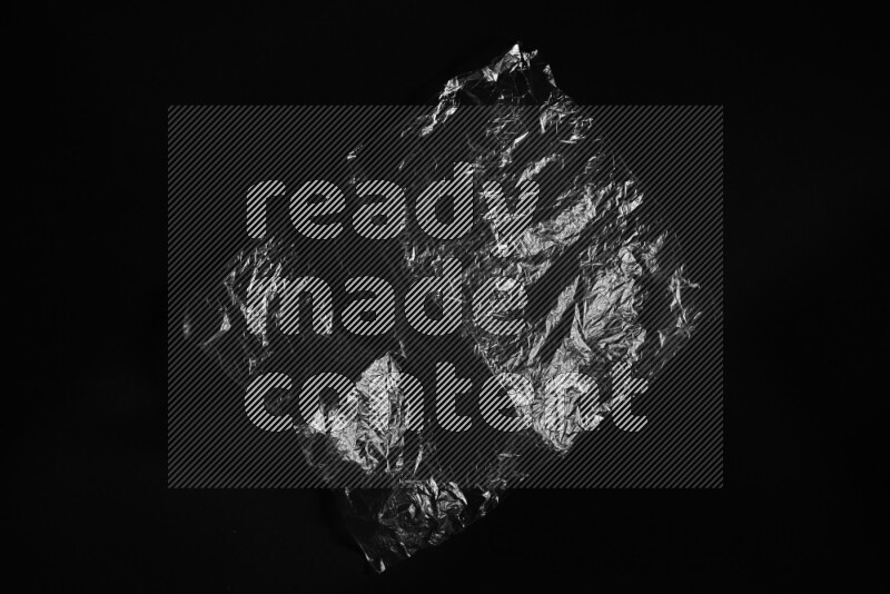 Transparent plastic textures on black background