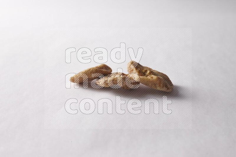 Dried figs on white background