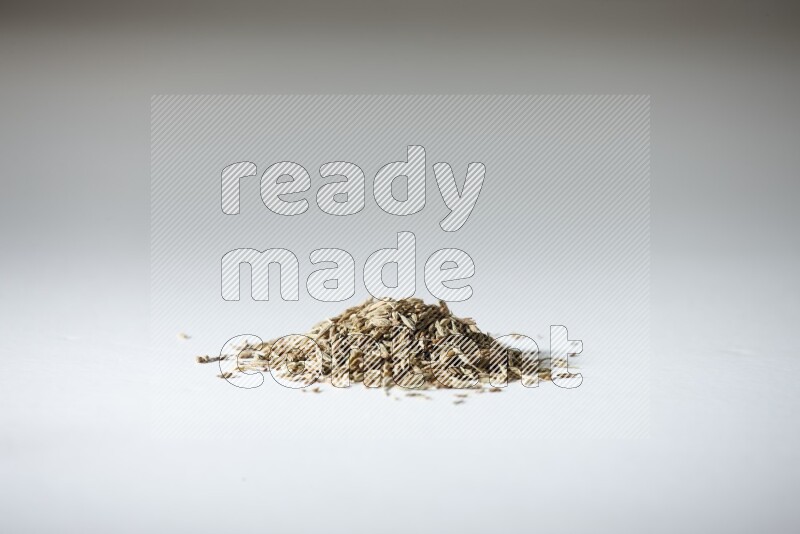Cumin seeds on white flooring